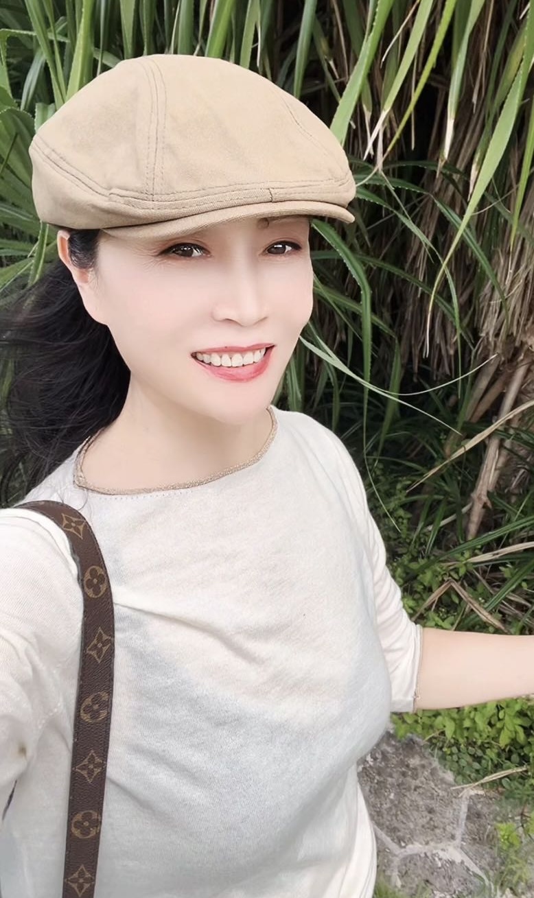李梅选